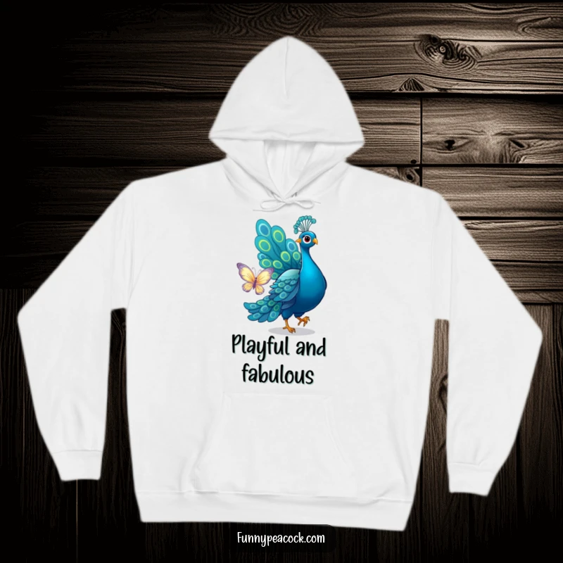 Funny peacock hoodie, humorously chasing a butterfly with its tail, offering cozy comfort and a touch of playful charm.